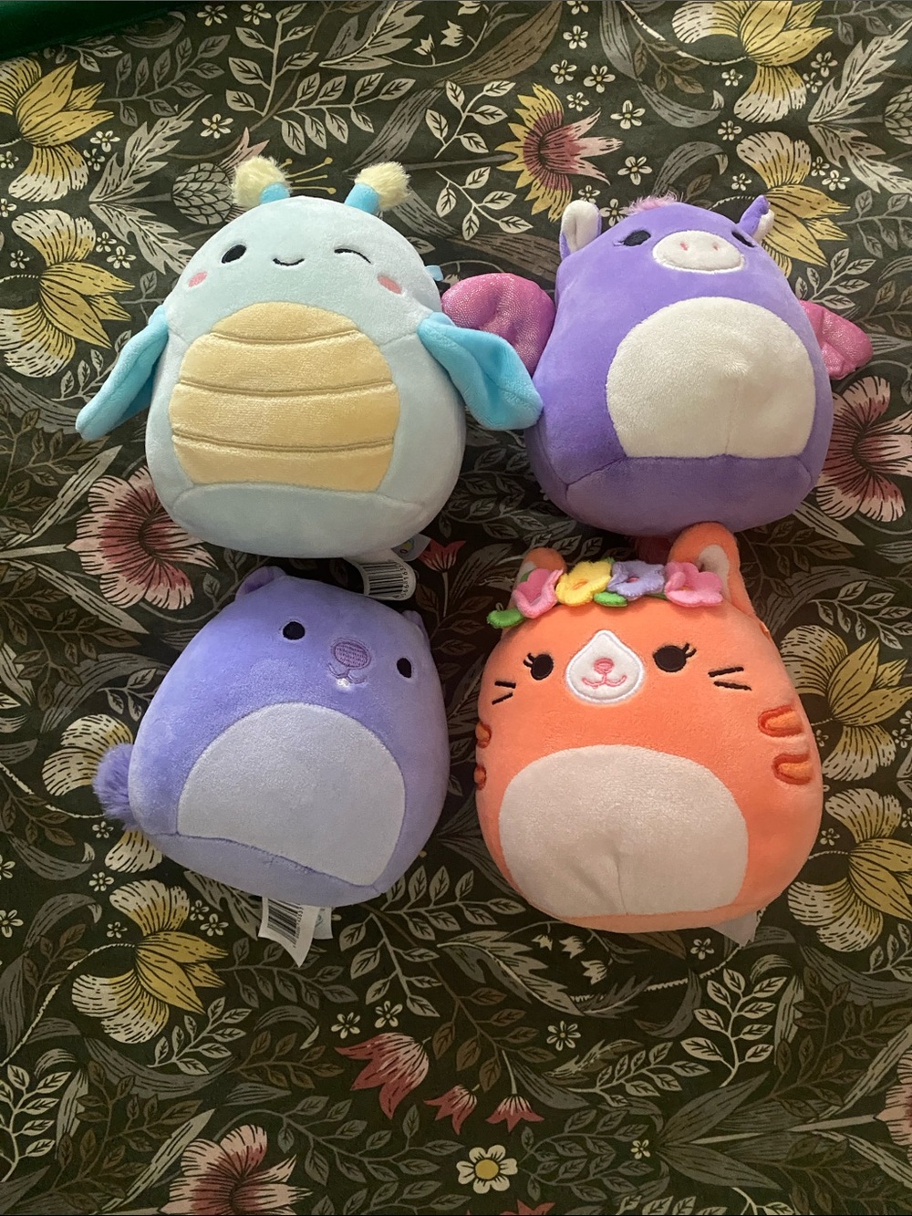 4 plush squish characters